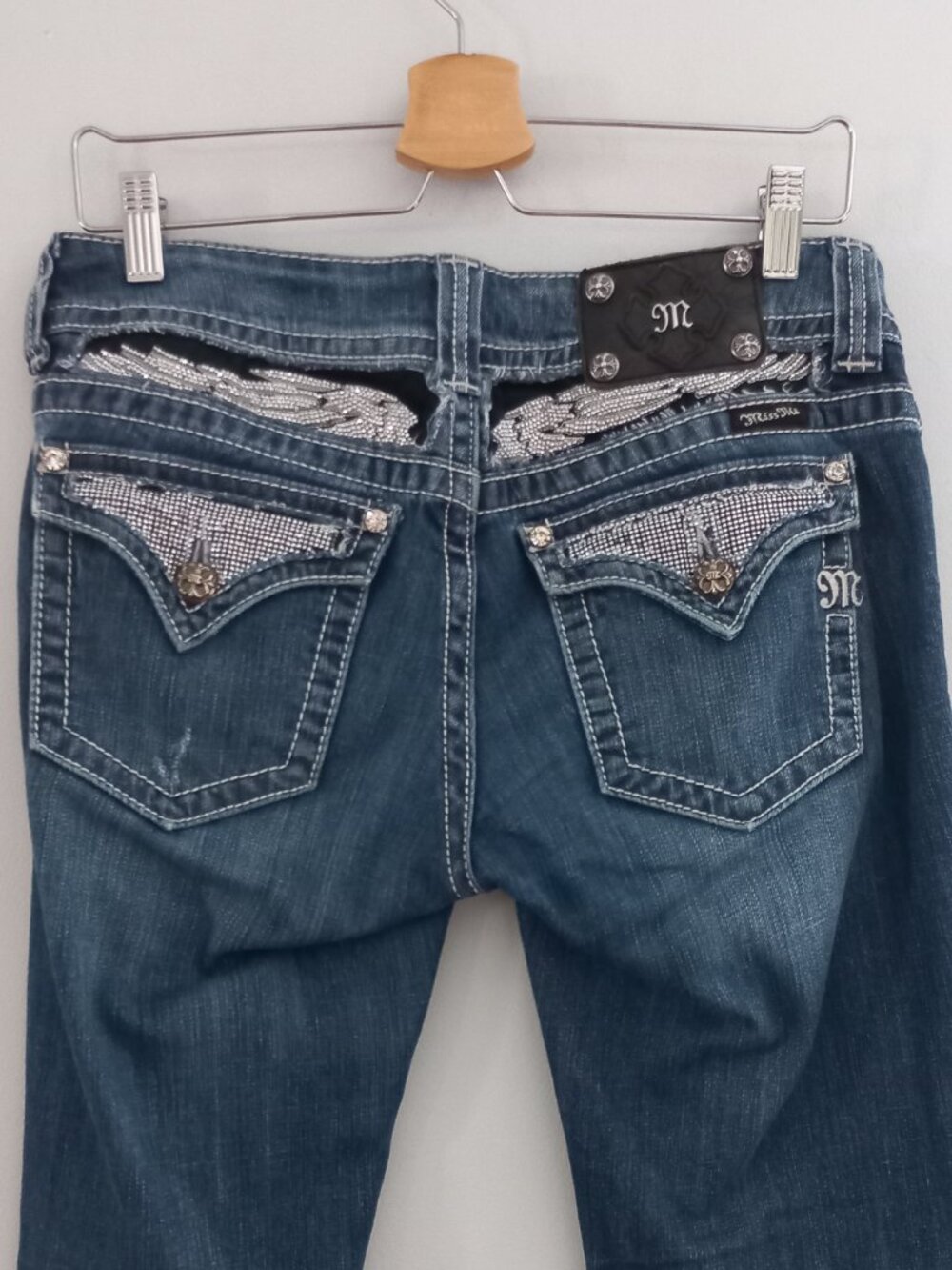 MISS ME rhinestone embellished angel wings flap pocket bootcut jeans